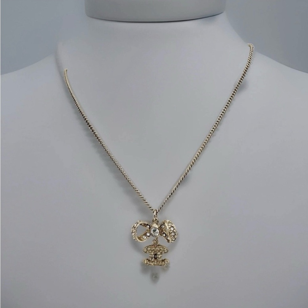 Auth🔥CHANEL Crystal Bow Necklace🌸W/ free COA /Chanel Box-EUC - Picture 4 of 15